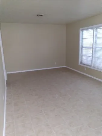 an empty room with a window