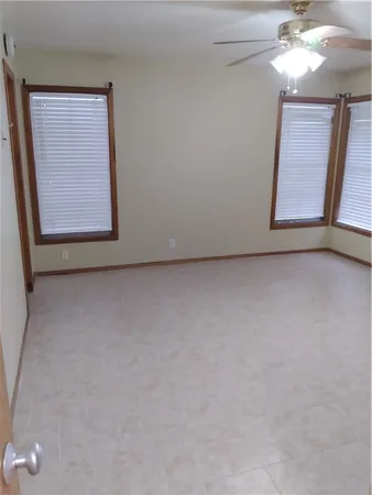 a view of an empty room with window