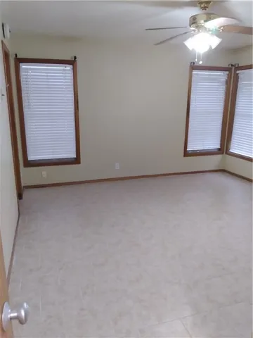 a view of an empty room with window