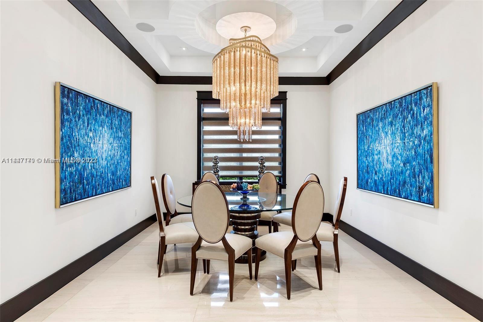 11880 Southwest 47th Street Miami, FL 33175 - Photo 14 of 61 a view of a dining room with furniture and wooden floor