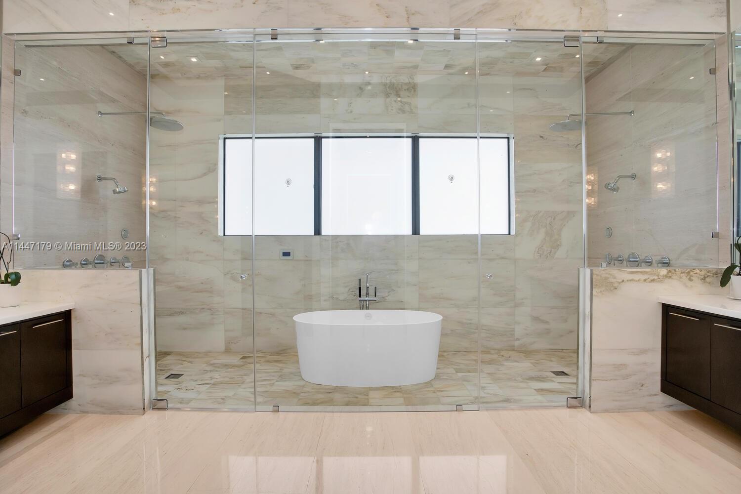 11880 Southwest 47th Street Miami, FL 33175 - Photo 26 of 61 a bathroom with a granite countertop sink a mirror and shower