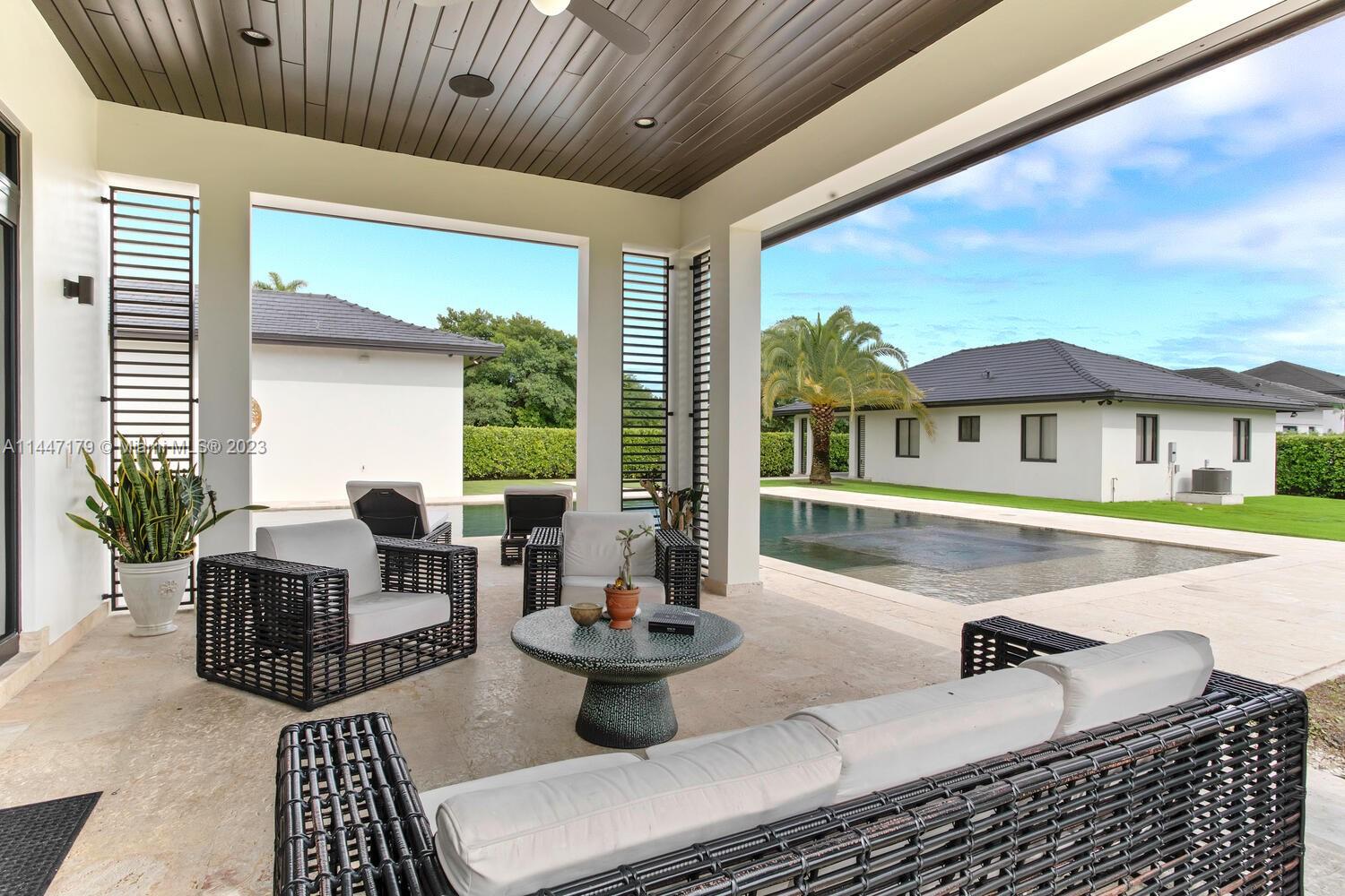11880 Southwest 47th Street Miami, FL 33175 - Photo 41 of 61 a outdoor living space with furniture and garden view