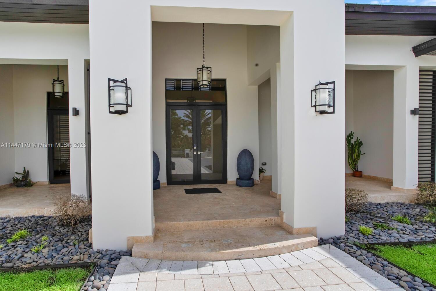11880 Southwest 47th Street Miami, FL 33175 - Photo 50 of 61 a view of a hallway with wooden floor and a living room
