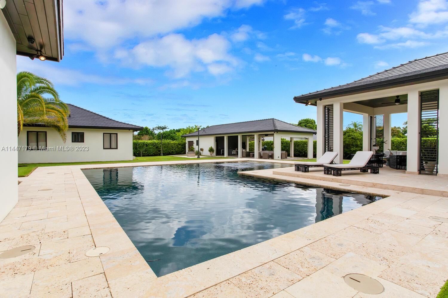 11880 Southwest 47th Street Miami, FL 33175 - Photo 54 of 61 swimming pool view with a seating space
