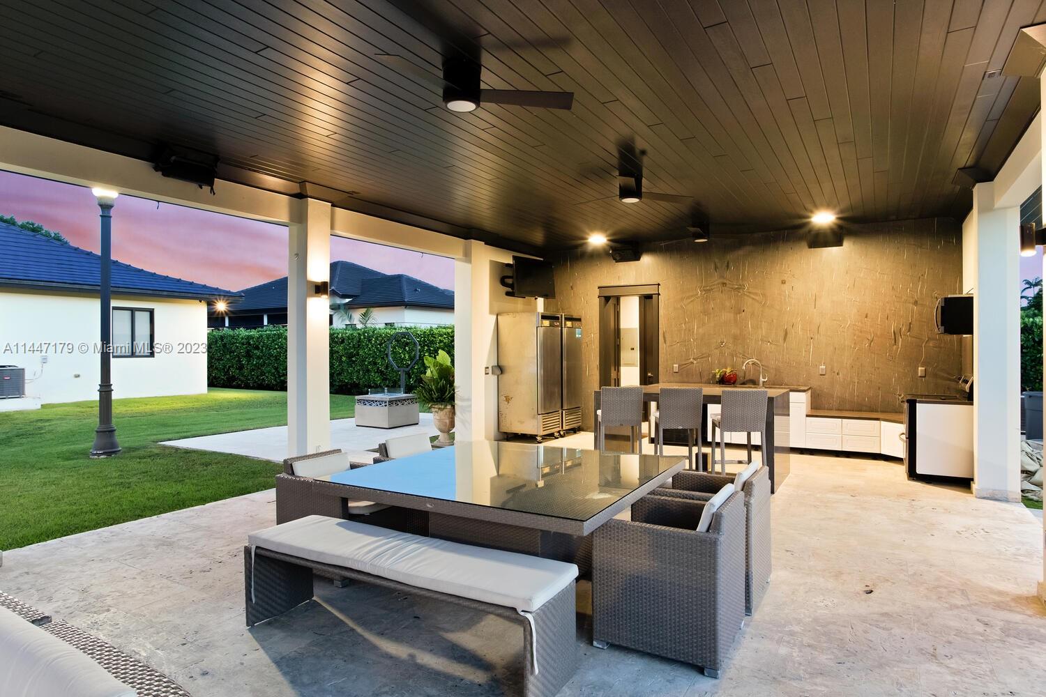 11880 Southwest 47th Street Miami, FL 33175 - Photo 7 of 61 a outdoor space with patio lots of furniture and garden view