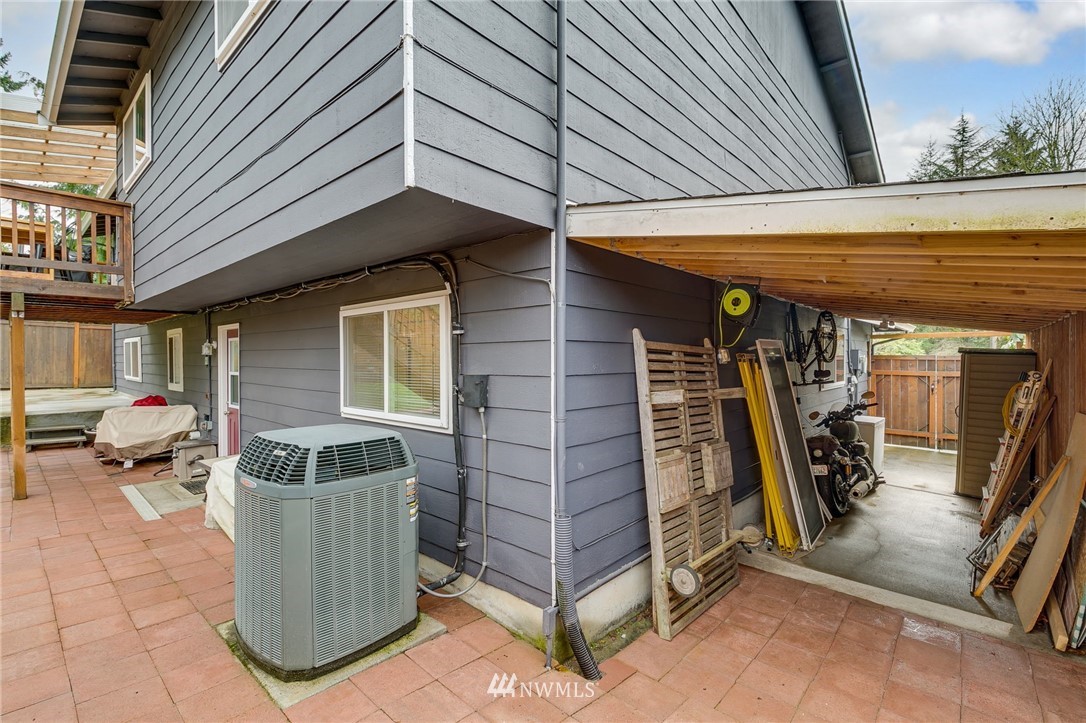519 213th Place Southwest Bothell, WA 98021 - Photo 32 of 34 a view of a patio with table and chairs