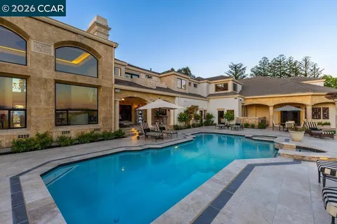 swimming pool view with a outdoor space