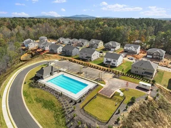 a view of a balcony with floor to ceiling windows