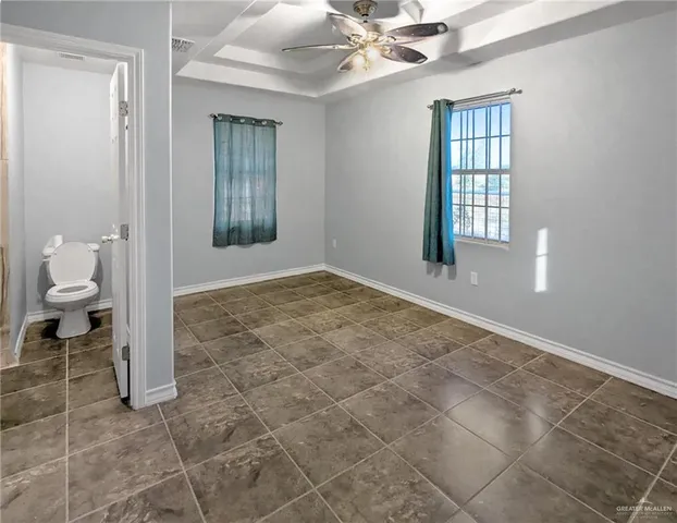 a bathroom with a sink vanity and mirror