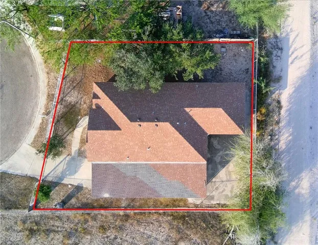 an aerial view of residential building and ocean