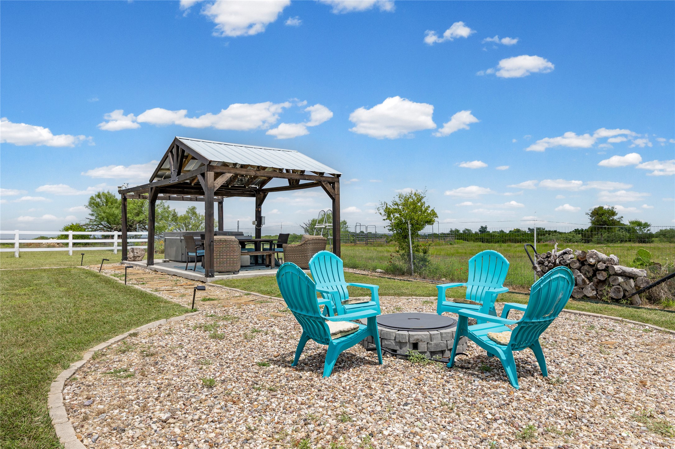 1283 Rattlesnake Trail Burnet, TX 78611 - Photo 35 of 39 a view of a chairs and tables in the patio