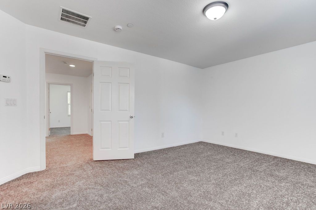 4650 Ranch House Road, Unit 47 North Las Vegas, NV 89031 - Photo 27 of 43 A spacious room offers ample potential, ready for personalization.