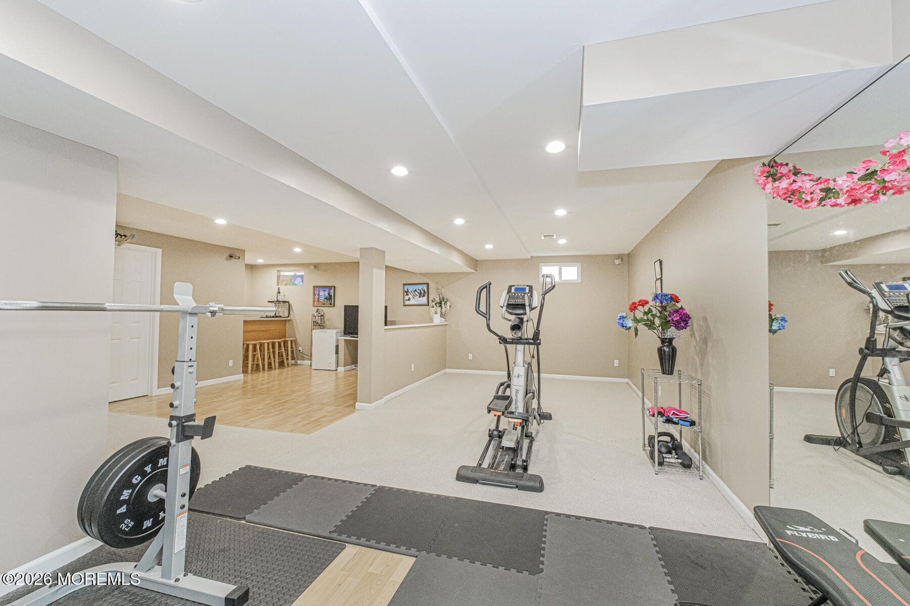 315 Wedgewood Road Morganville, NJ 07751 - Photo 19 of 37 a view of a room with gym equipment