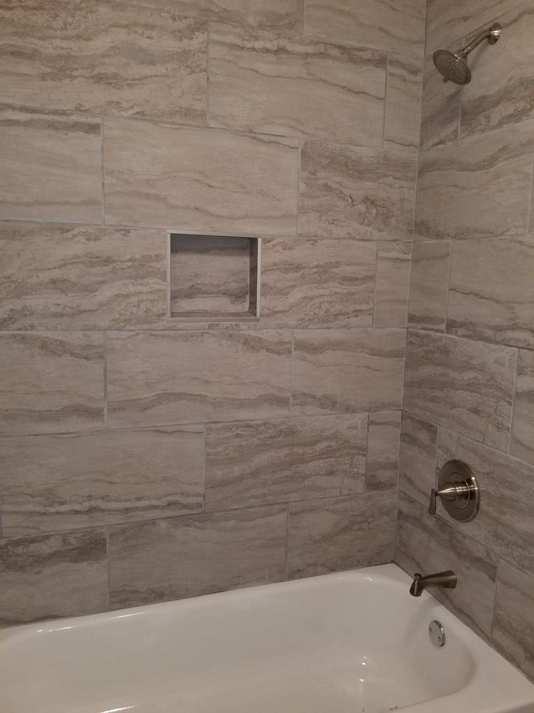 10089 County Line Road Midland, GA 31820 - Photo 26 of 27 a bathroom with a bathtub