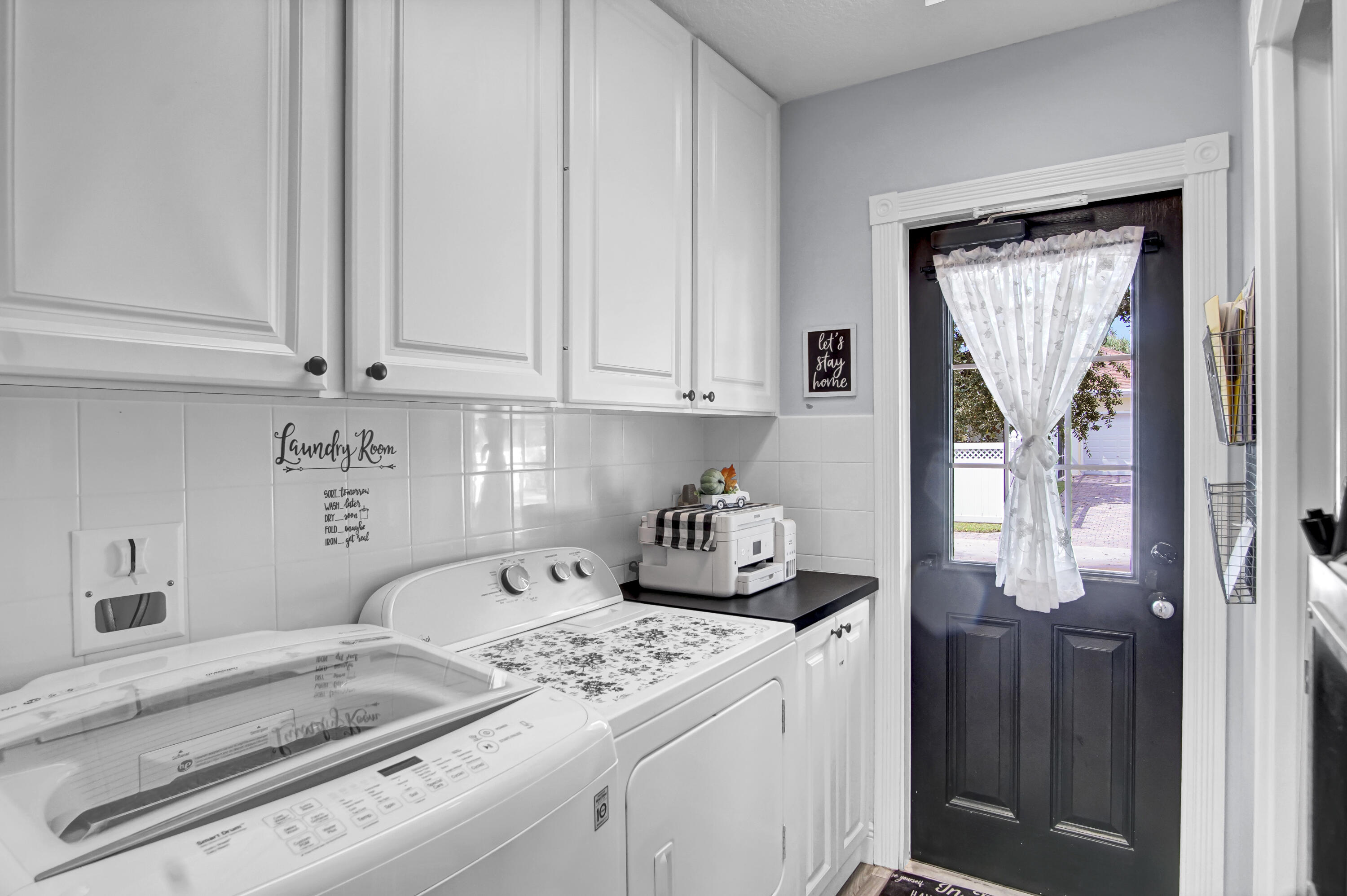 3232 West Community Drive Jupiter, FL 33458 - Photo 14 of 51 Laundry to Backyard