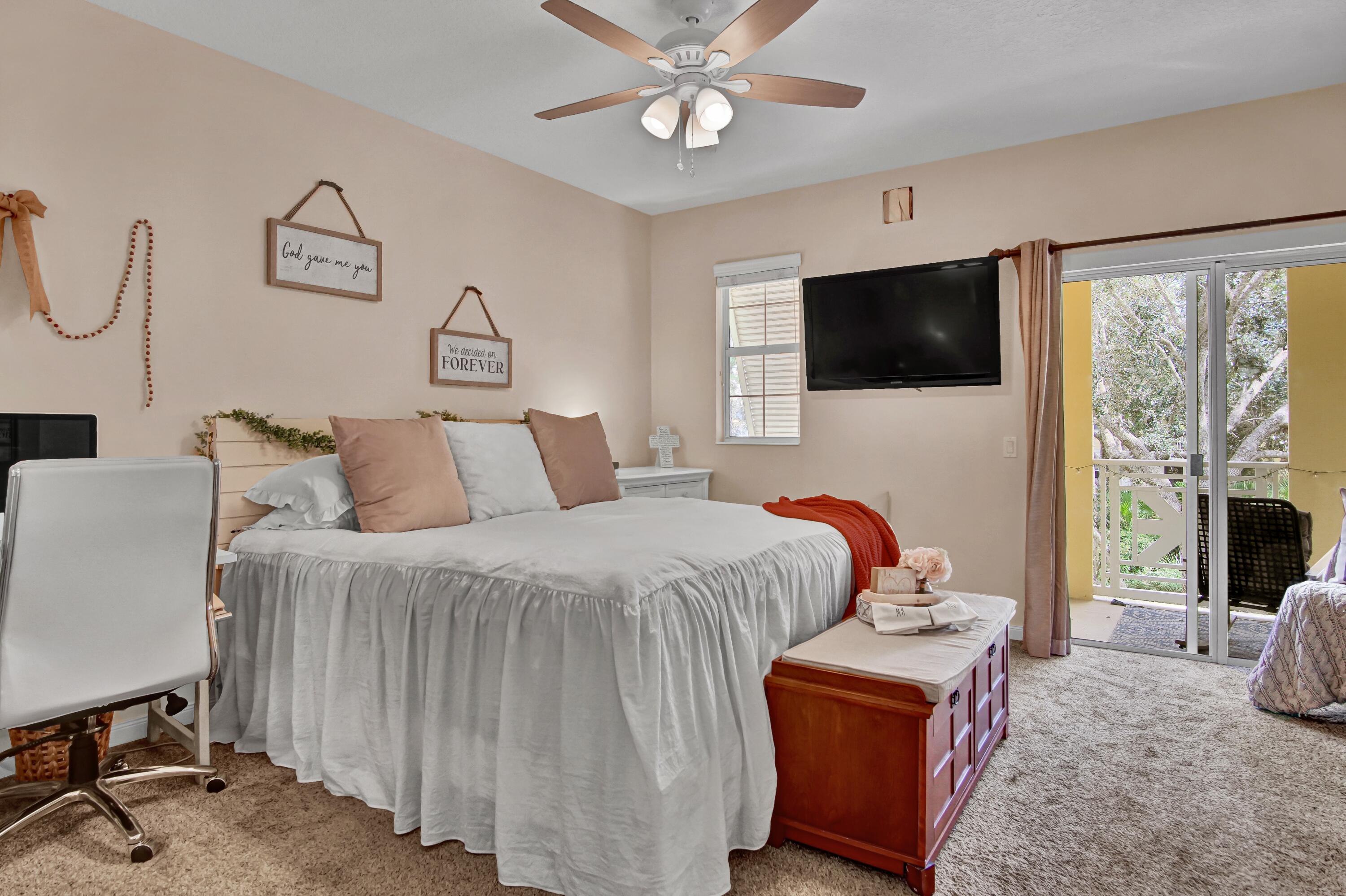 3232 West Community Drive Jupiter, FL 33458 - Photo 19 of 51 Main Bedroom Entry to Patio