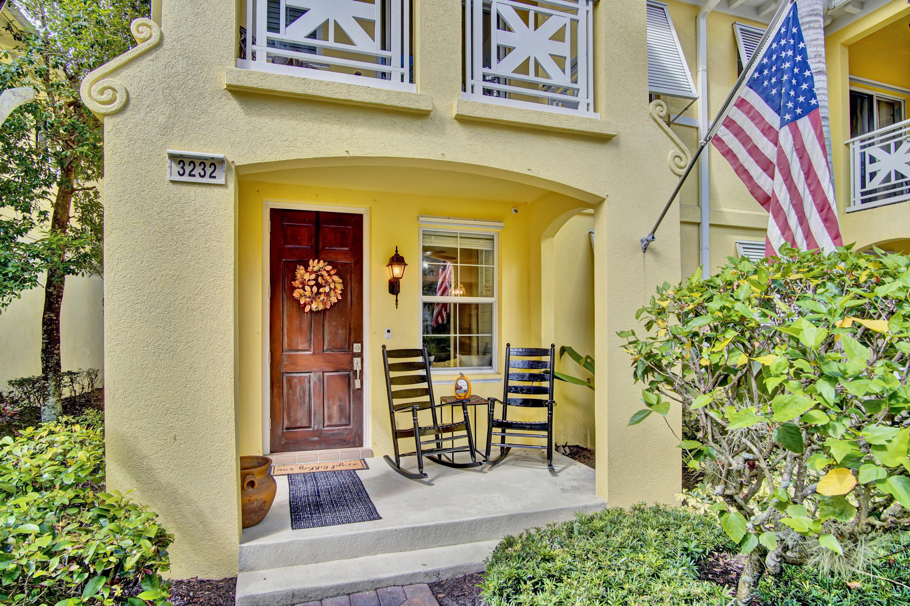 3232 West Community Drive Jupiter, FL 33458 - Photo 3 of 51 Front Exterior Patio