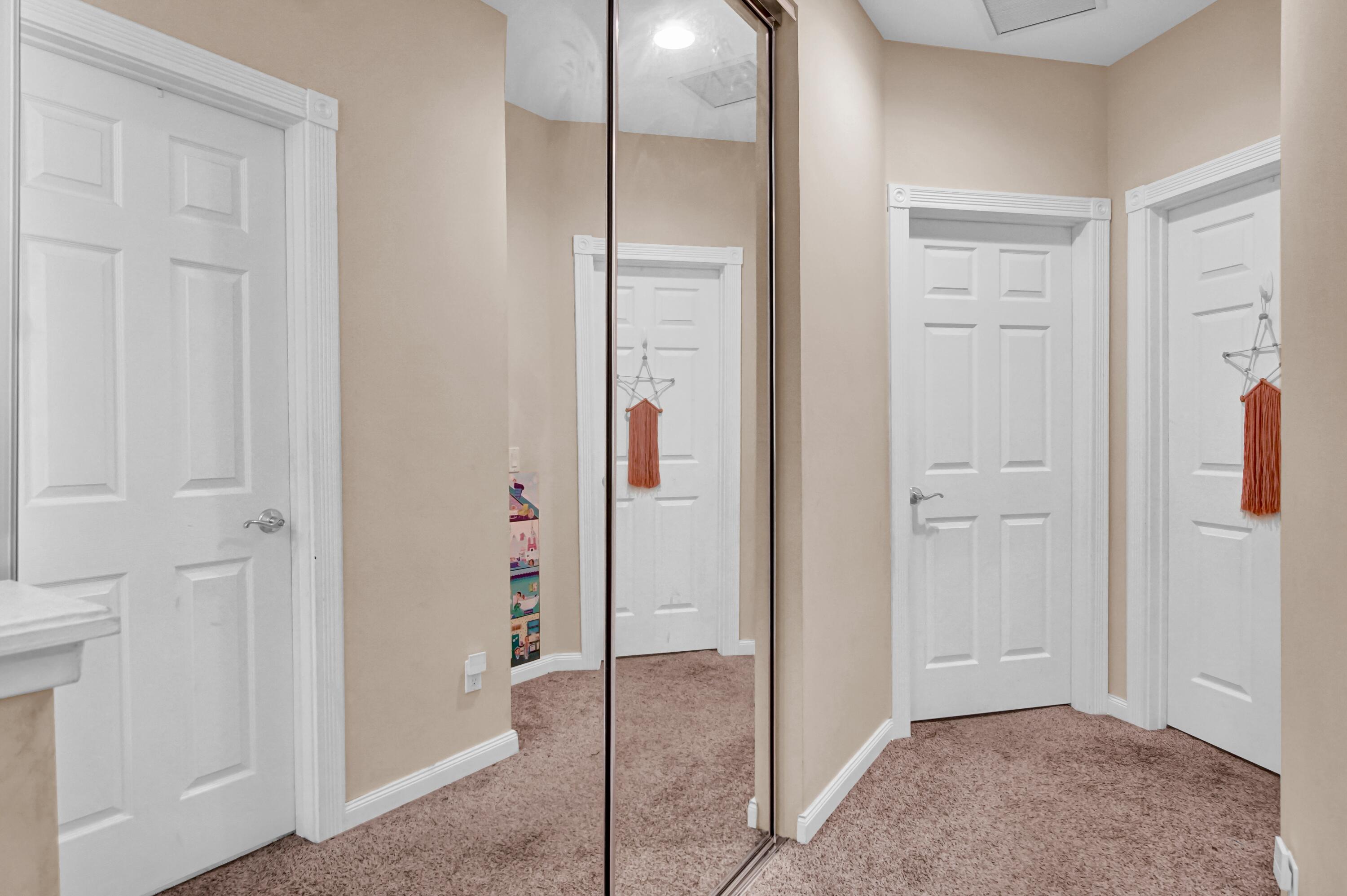 3232 West Community Drive Jupiter, FL 33458 - Photo 36 of 51 2nd Floor Hallway Storage
