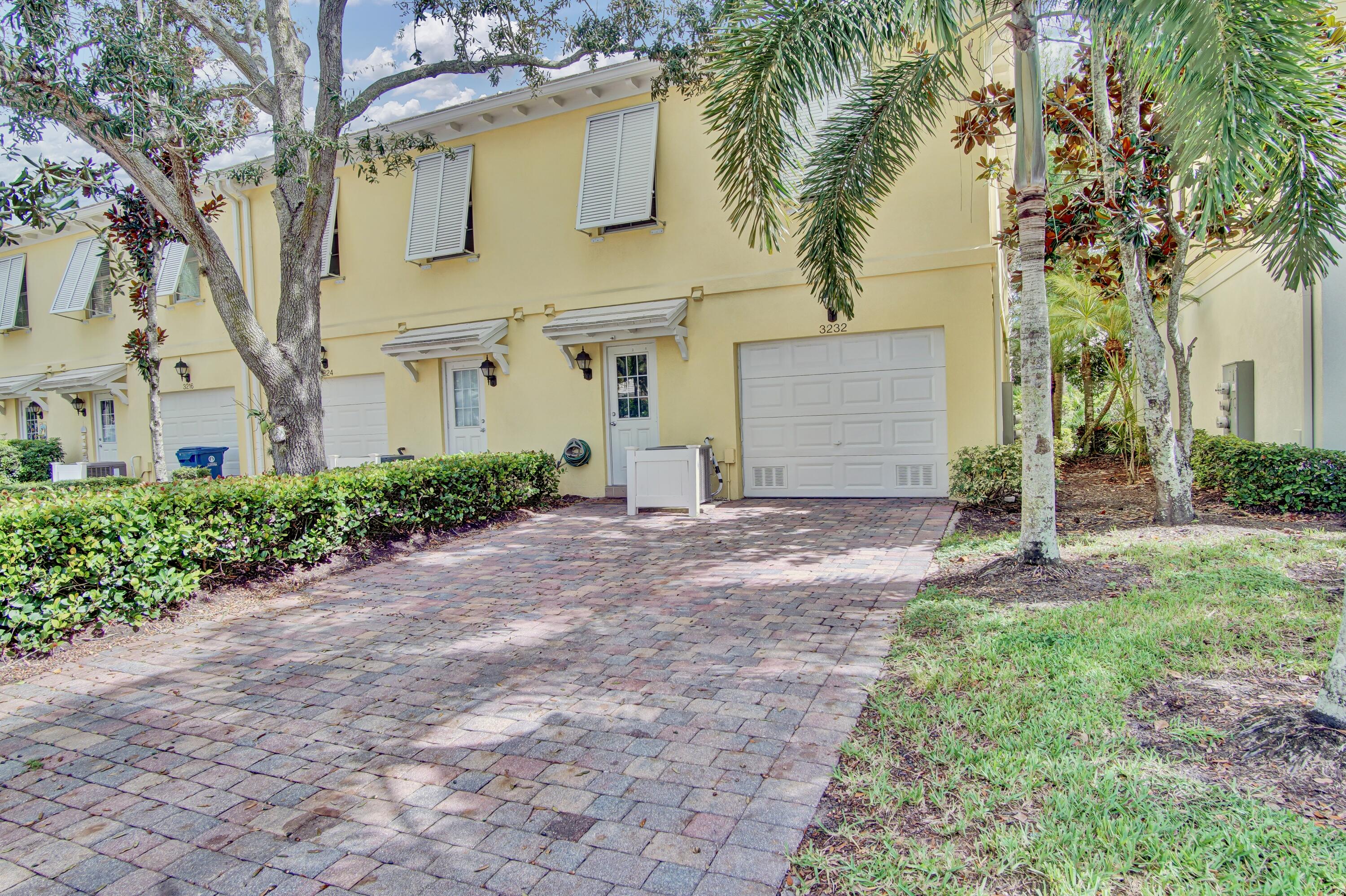 3232 West Community Drive Jupiter, FL 33458 - Photo 38 of 51 Rear Exterior Garage (2)