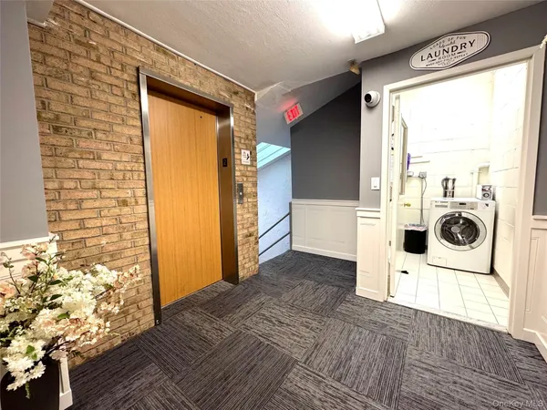 a view of utility and utility room