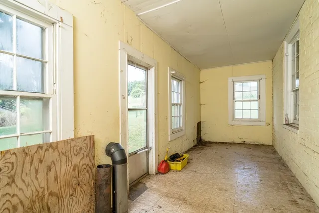 a bathroom with a tub and a sink