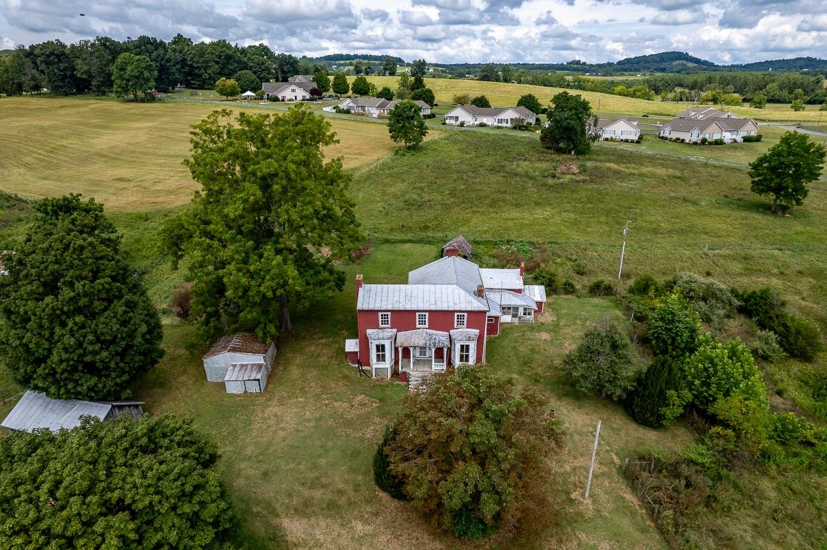 5787 Borden Grant Trail Raphine, VA 24472 - Photo 33 of 52 an aerial view of residential houses with outdoor space and lake view