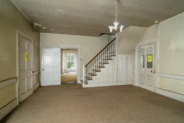 a view of livingroom with furniture and fireplace