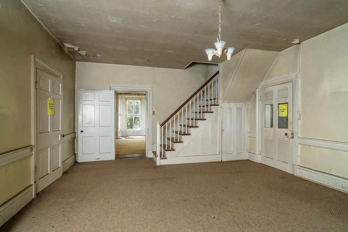 5787 Borden Grant Trail Raphine, VA 24472 - Photo 4 of 52 a view of entryway and hall with a chandelier