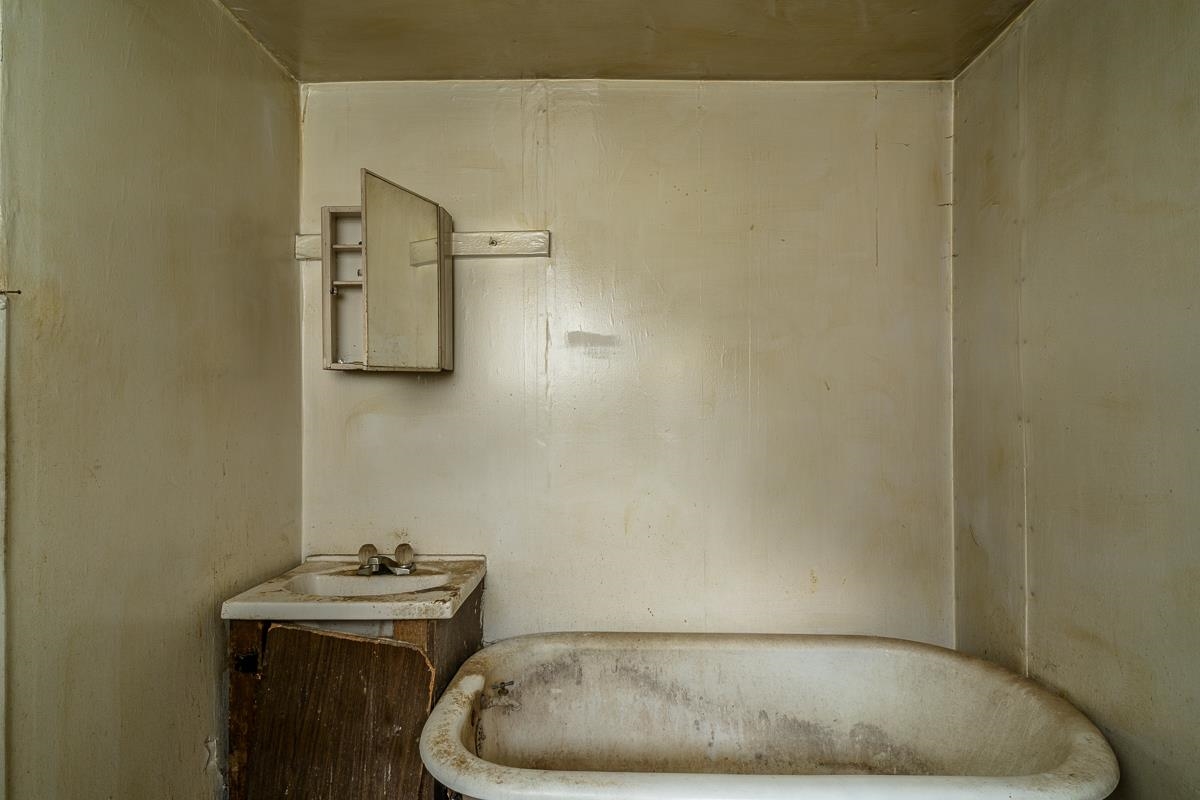 5787 Borden Grant Trail Raphine, VA 24472 - Photo 10 of 52 a bathroom with a sink and mirror
