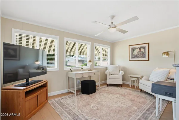 a kitchen with stainless steel appliances granite countertop a refrigerator a sink a stove and a refrigerator