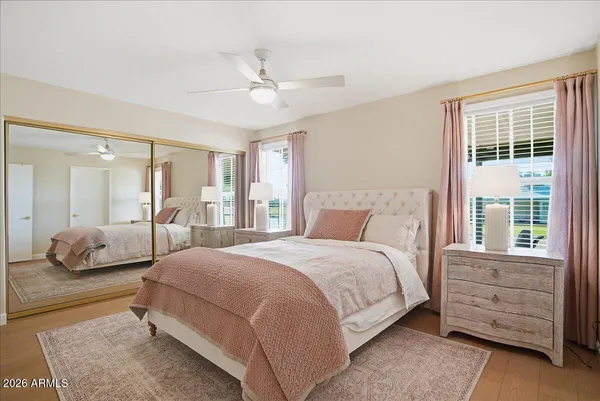 a kitchen with stainless steel appliances granite countertop a refrigerator sink and stove