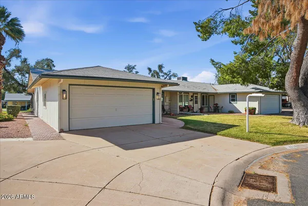 a view of a patio with swimming pool