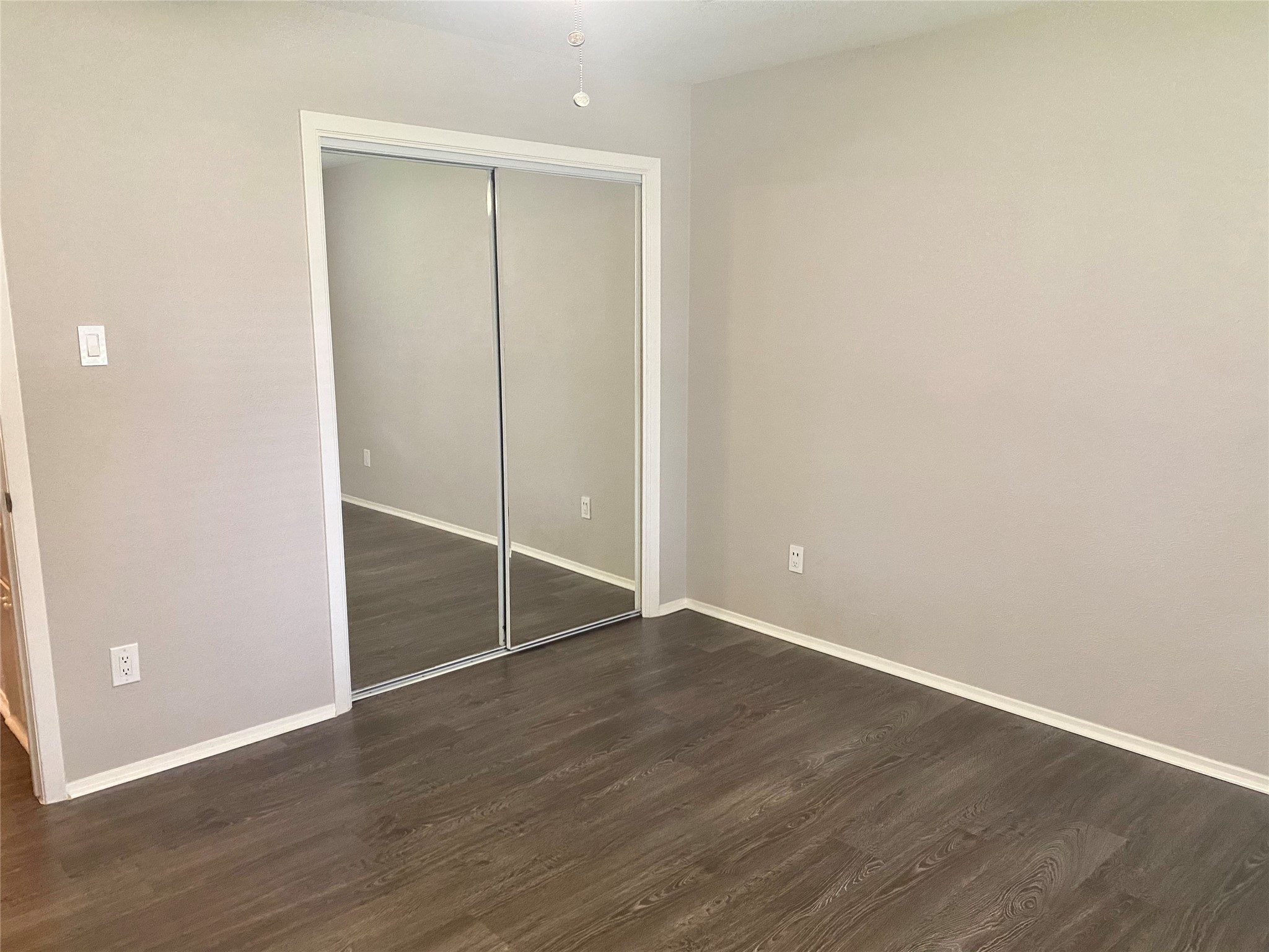 11505 Windermere Meadows Austin, TX 78759 - Photo 12 of 16 an empty room with wooden floor