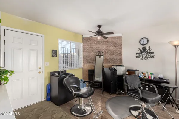 a room with furniture and musical instruments