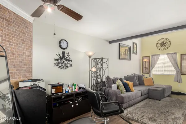 a living room with furniture and a window