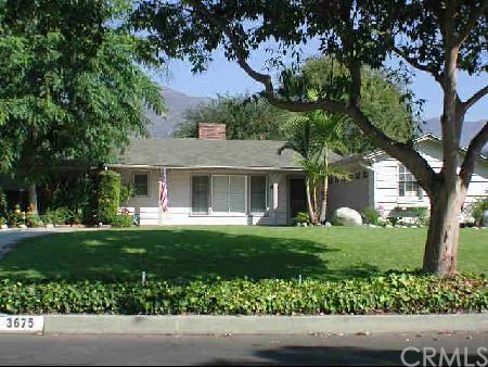 3675 Hampton Road Pasadena, CA 91107 - Photo 1 of 1 a front view of a house with a yard
