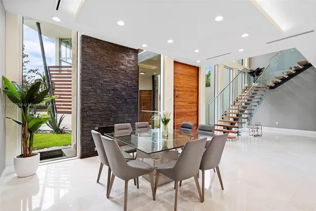 a bedroom with a bed and a view of lake
