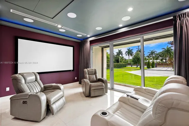 a bathroom with a sink tub double vanity and mirror