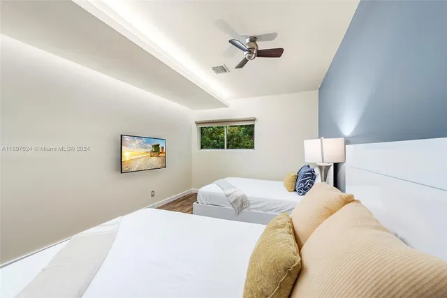 a view of a swimming pool with a lounge chairs