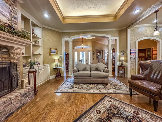 a living room with furniture and a rug
