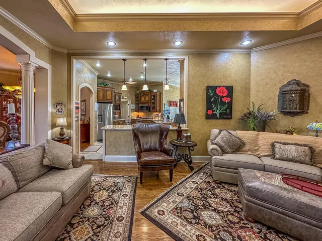 a view of a chairs and table in the patio
