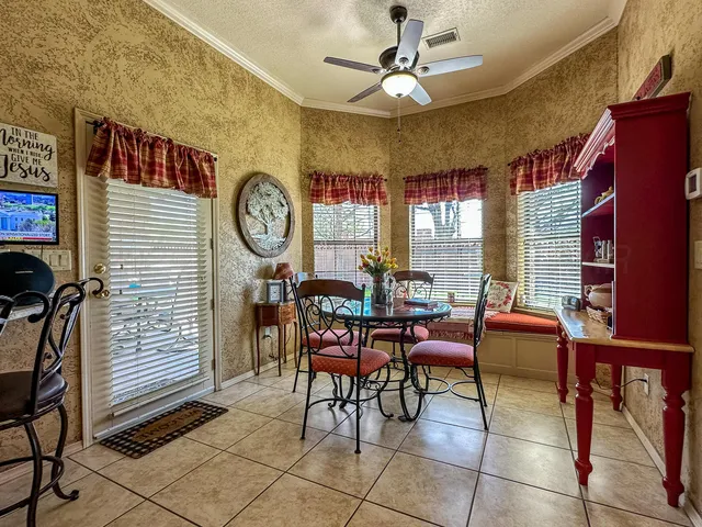 a bathroom with a toilet a sink and a mirror