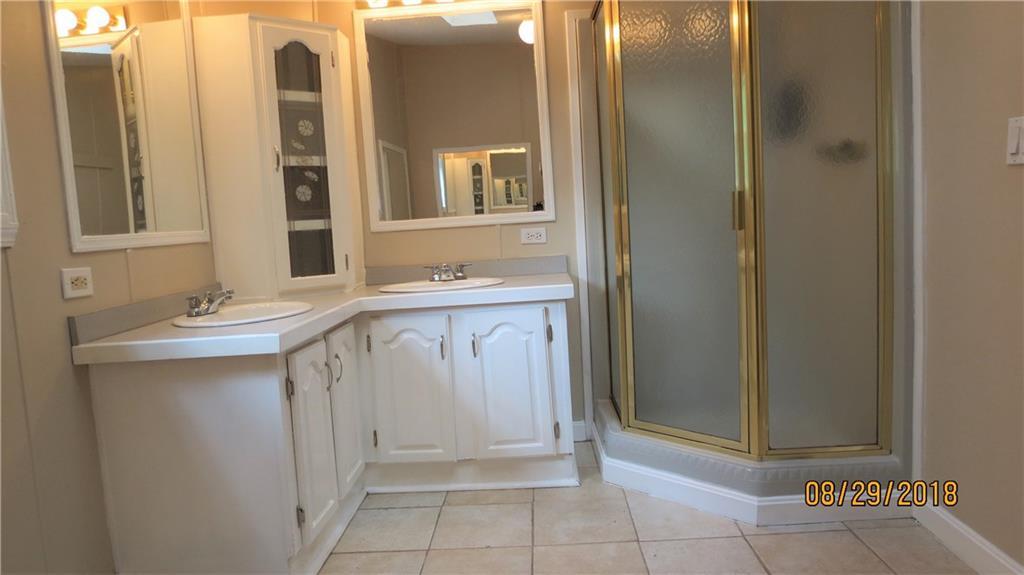 34 Winslow Road Naples, ME 04055 - Photo 21 of 29 Master bath offers a separate shower.