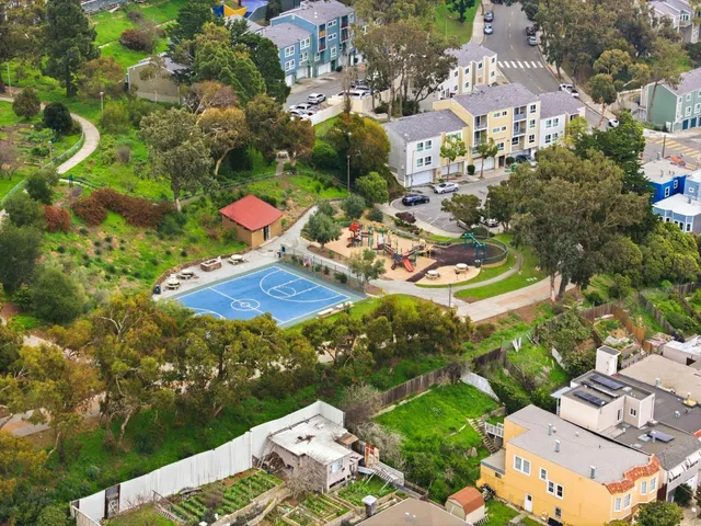 an aerial view of a house with yard swimming pool and outdoor seating
