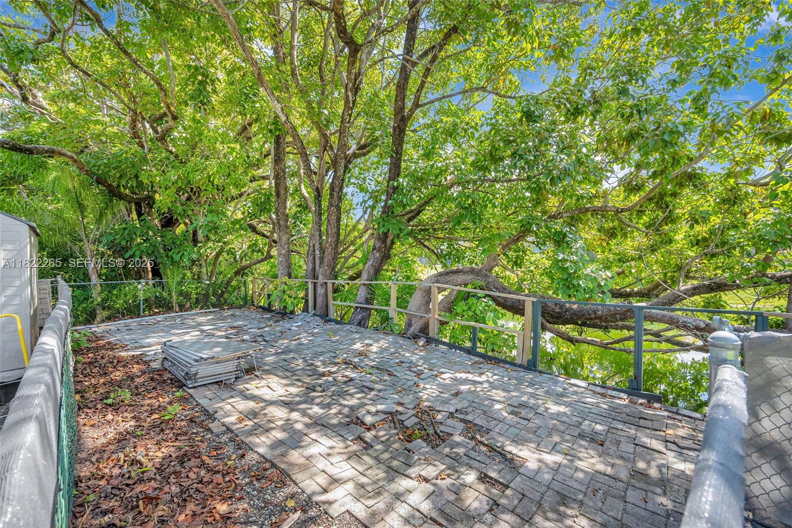 11230 Southwest 69th Court Pinecrest, FL 33156 - Photo 73 of 87 Leading to Canal in backyard