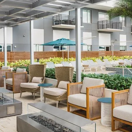 a balcony with furniture and outdoor view