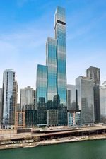 a view of a city with tall buildings