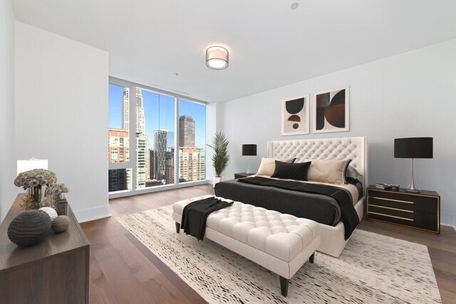 Undisclosed Address Chicago, IL 60601 - Photo 13 of 21 a bedroom with a bed and a couch