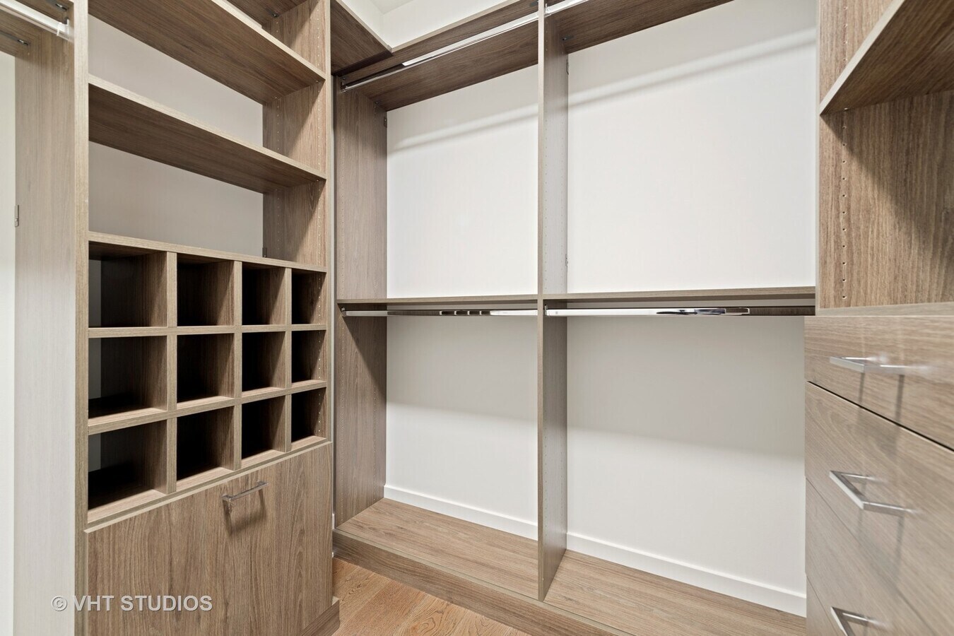 Undisclosed Address Chicago, IL 60601 - Photo 17 of 21 a view of walk in closet with empty racks