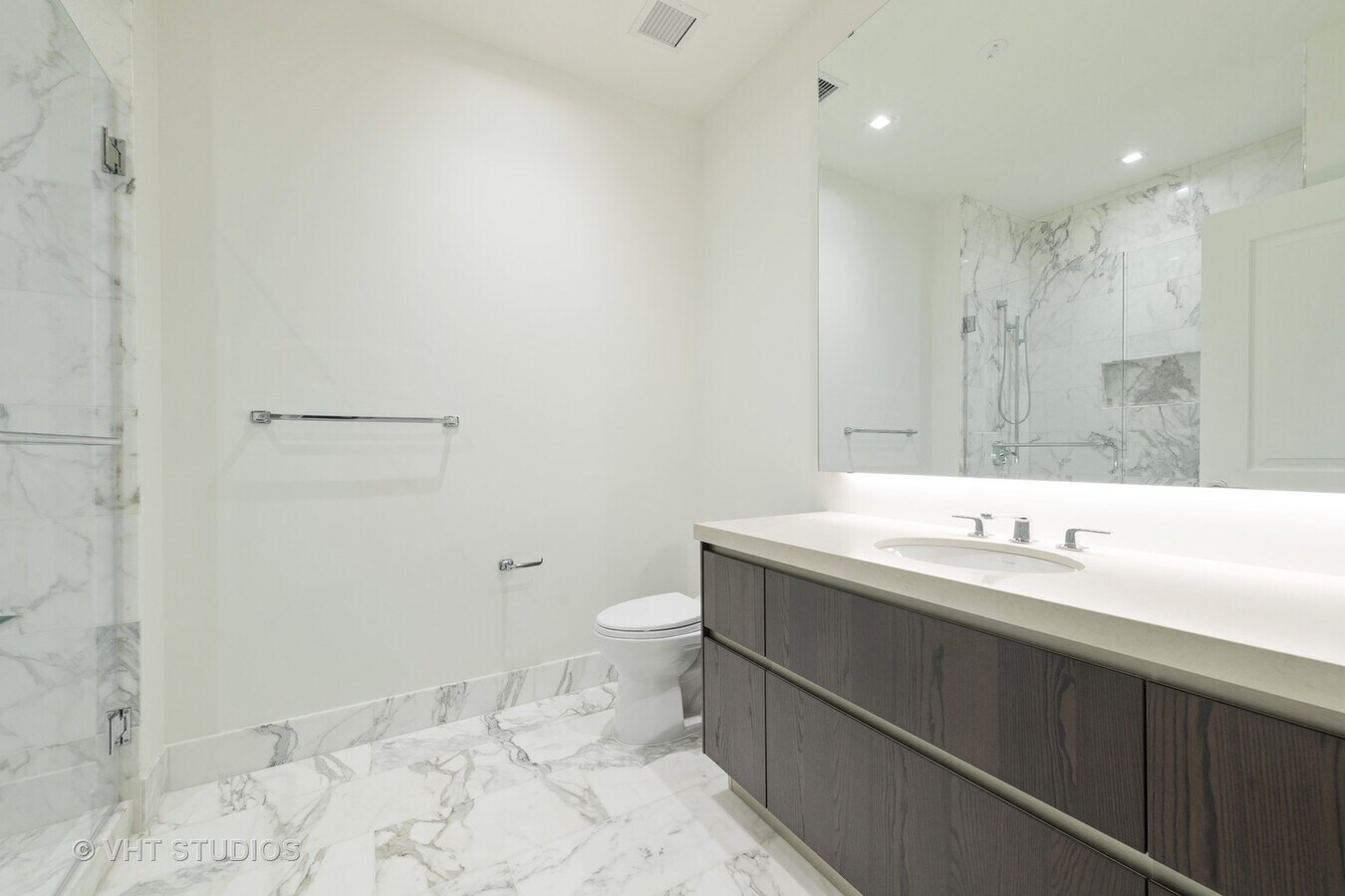 Undisclosed Address Chicago, IL 60601 - Photo 20 of 21 a bathroom with a sink a toilet and shower